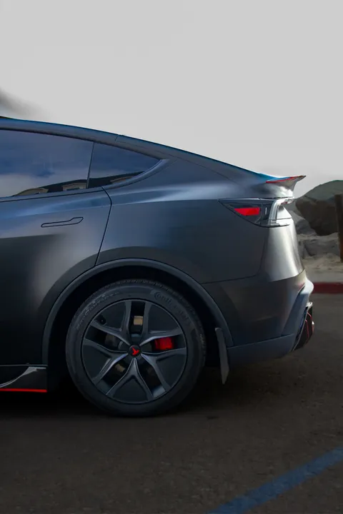 Tesla Model Y (2025), Satin black with red accents